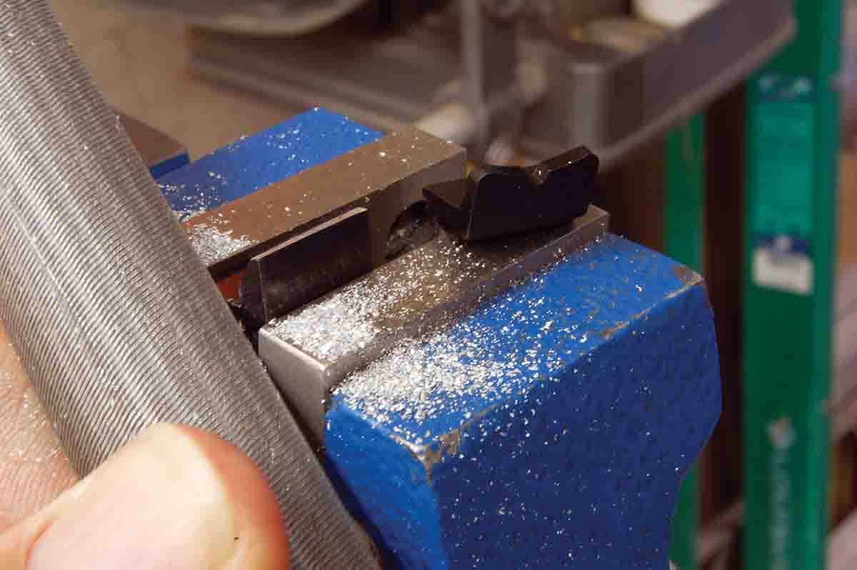 Filing a WGS rear sight blade flat on top (left) with unaltered blade (right).